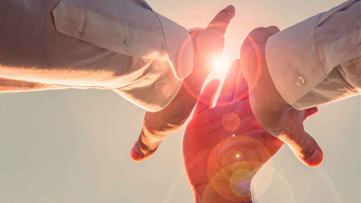 Three hands give High Five