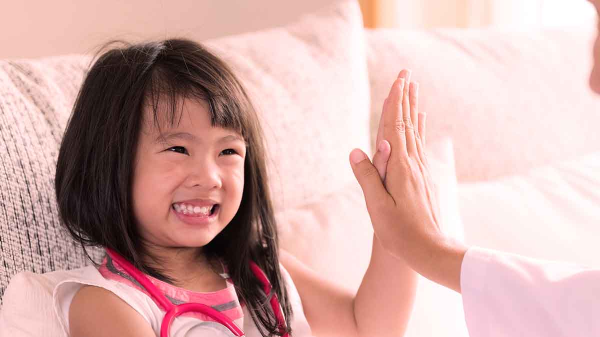 Girl gives High Five